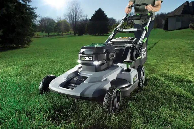 Person mowing lawn with EGO lawn mower